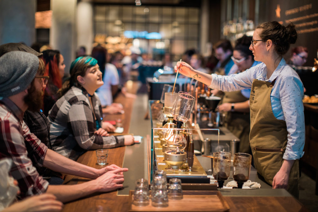 Starbucks partners work in the new Starbucks Reserve store at the Starbucks Support Center in Seattle on Wednesday, February 21, 2018. (Joshua Trujillo, Starbucks)